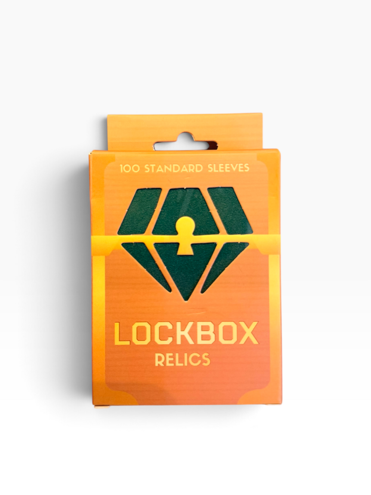 A retail package of Lockbox Relics containing 100 standard sleeves, featuring a bright orange and yellow gradient design with a dark green diamond and keyhole logo, set against a plain white background.