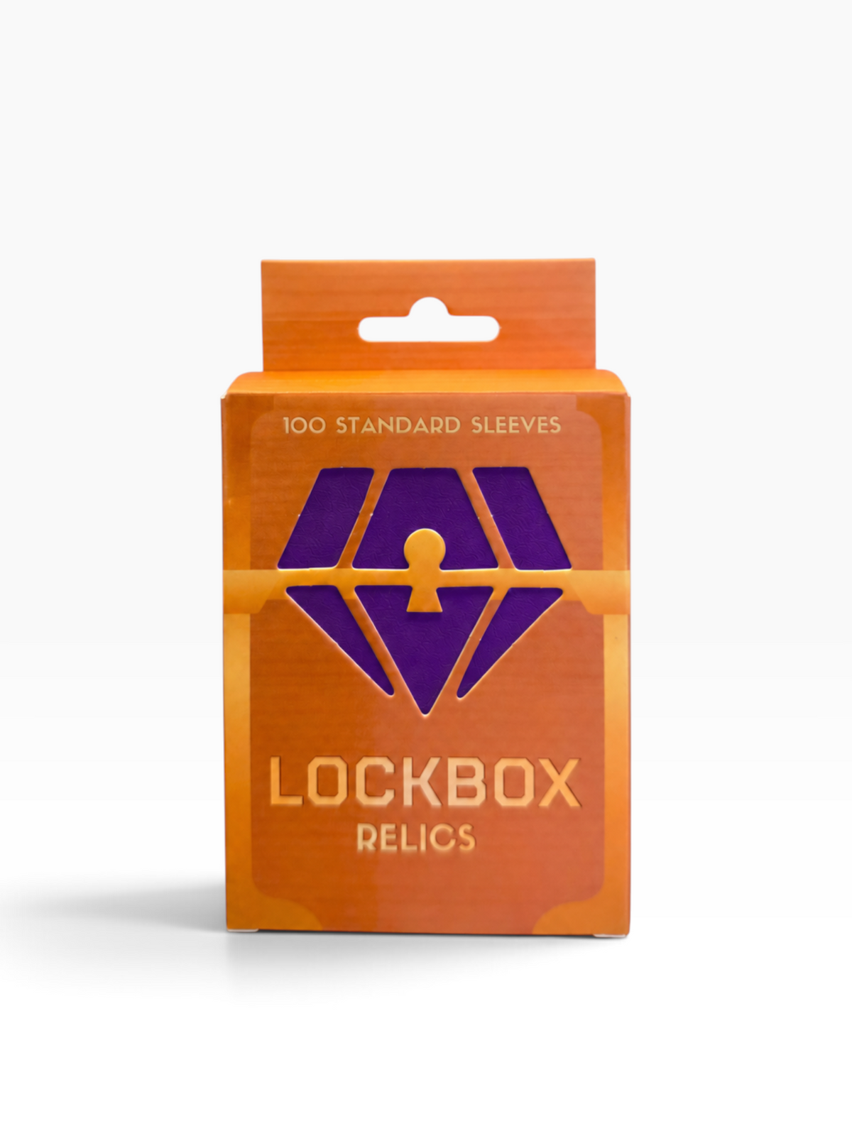 A retail package of 'Lockbox Relics' containing 100 standard sleeves, featuring a metallic orange and purple box with a diamond-shaped keyhole logo.